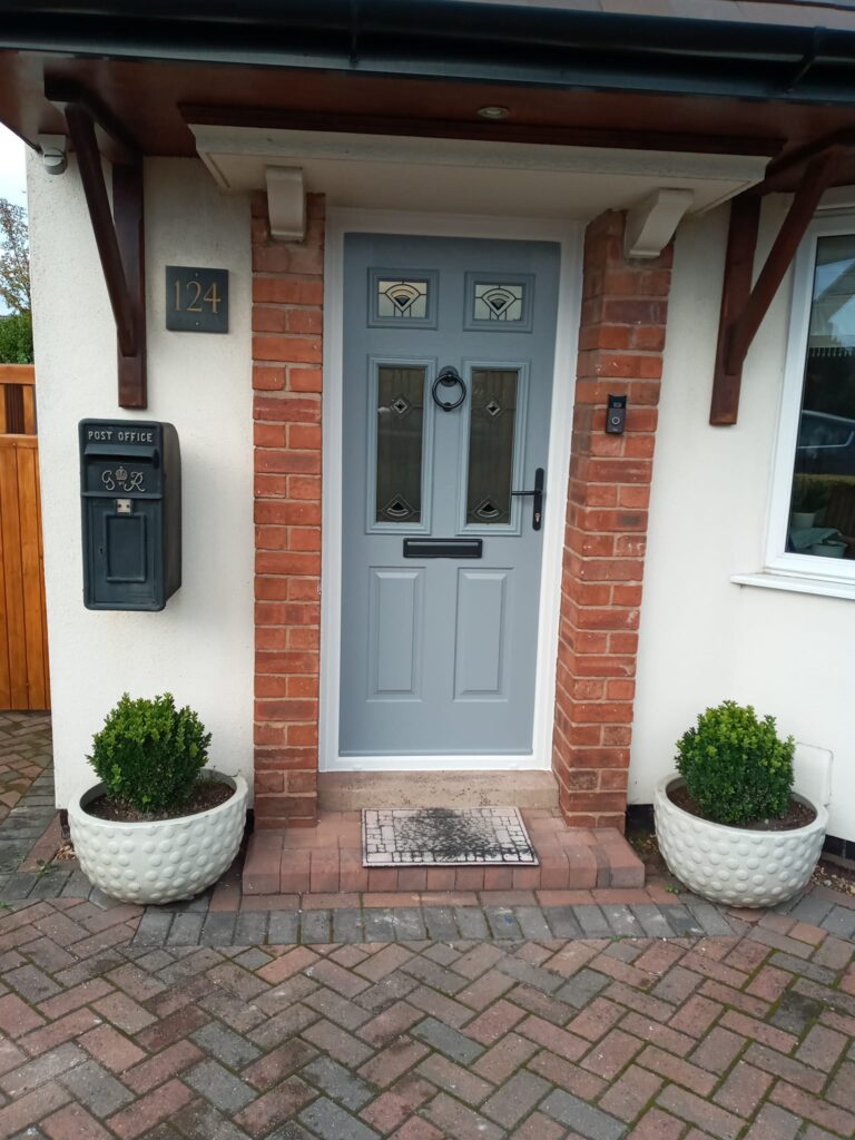 Anthracite grey UPVC composite door with frosted glass panels installed - UPVC Repairs Cannock